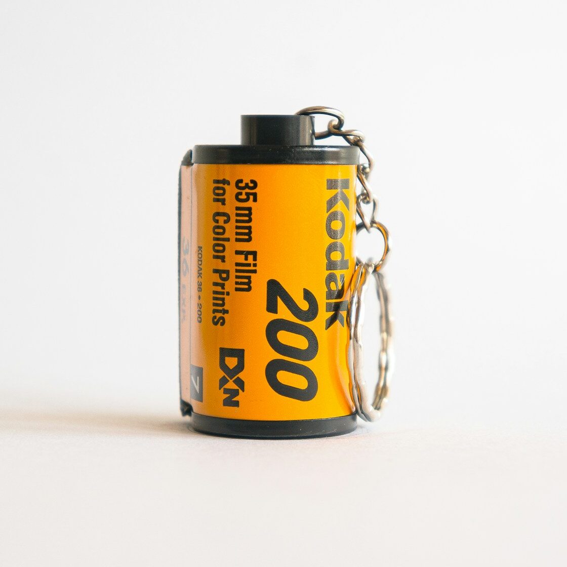 black and yellow UNKs coffee can